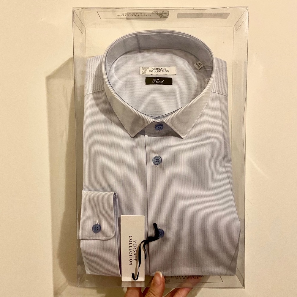 Versace “Camicia (in Blanco-Azzurro)” shirt.